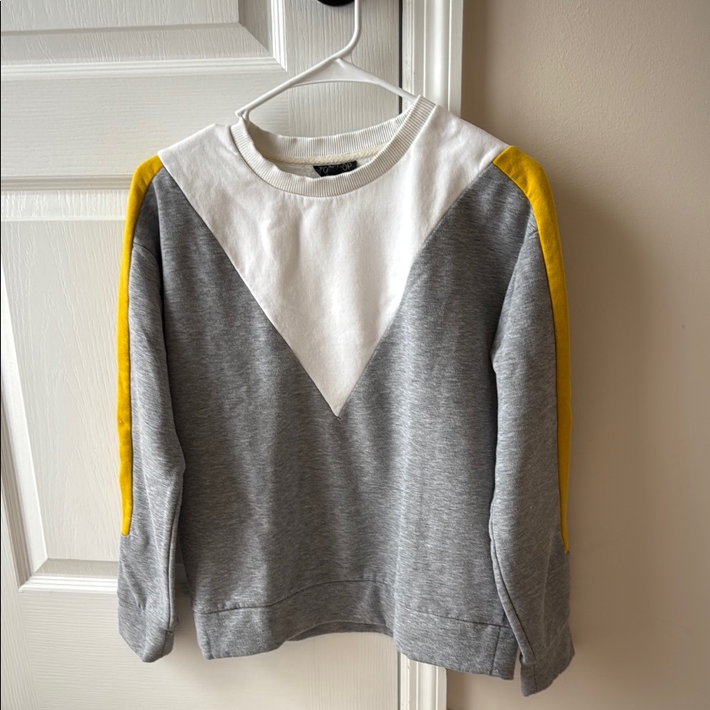Gray and White Sweatshirt with Yellow Accents